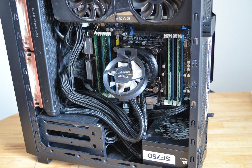 There are no real ways to hide cables in this case when you put this hardware in it. Corsairs sleeved cables save the day by not looking too bad. Old photo.