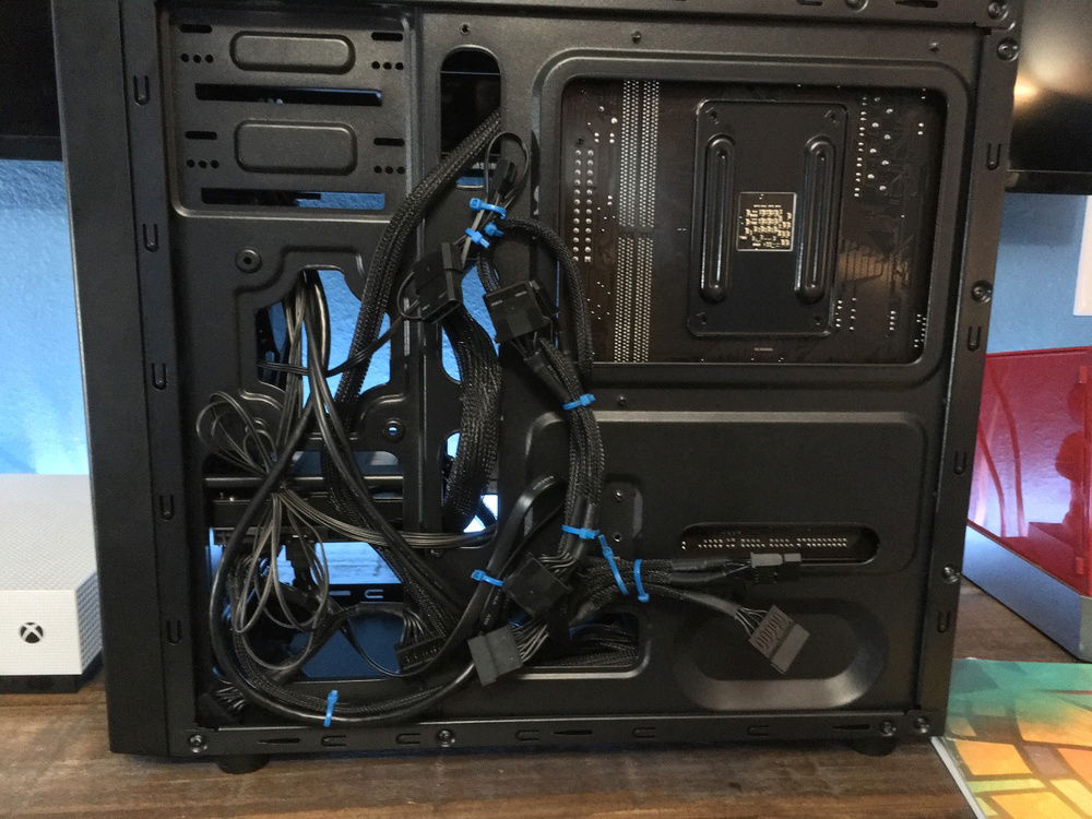 Got the cables to fit in the back but it pretty hard now to put the back panel on. I did check and the cables are ok and nothings broken from them being squished together.