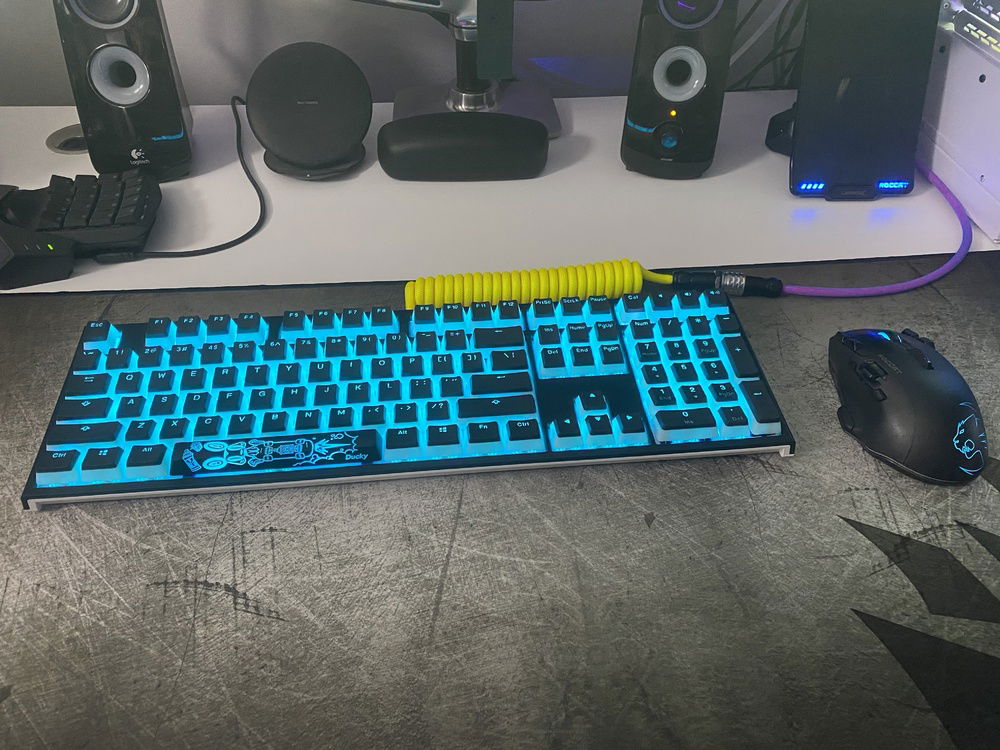The work setup: Ducky One2 RGB w/ MX Brown switches, LOOP Pudding V2 keycaps from Drop.com & a custom Jumbo Coiled cable from mechcables.com