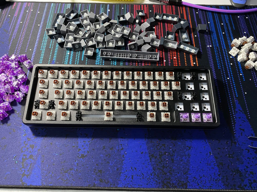 I had already swapped the Halo True switches for some Kailh Box Browns, as I'm a heathen that loves to bottom out, and the True's aren't a fit for me.   Now I'm swapping out the Browns for some Everglide Crystal Violets.