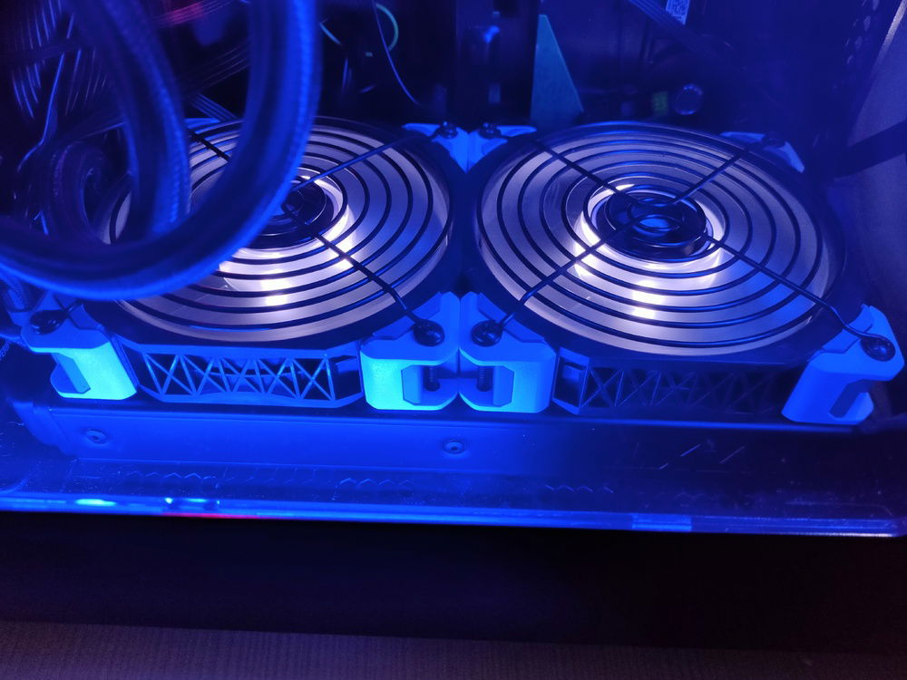 Bottom X52 radiator with custom Corsair ML120 PRO fans.