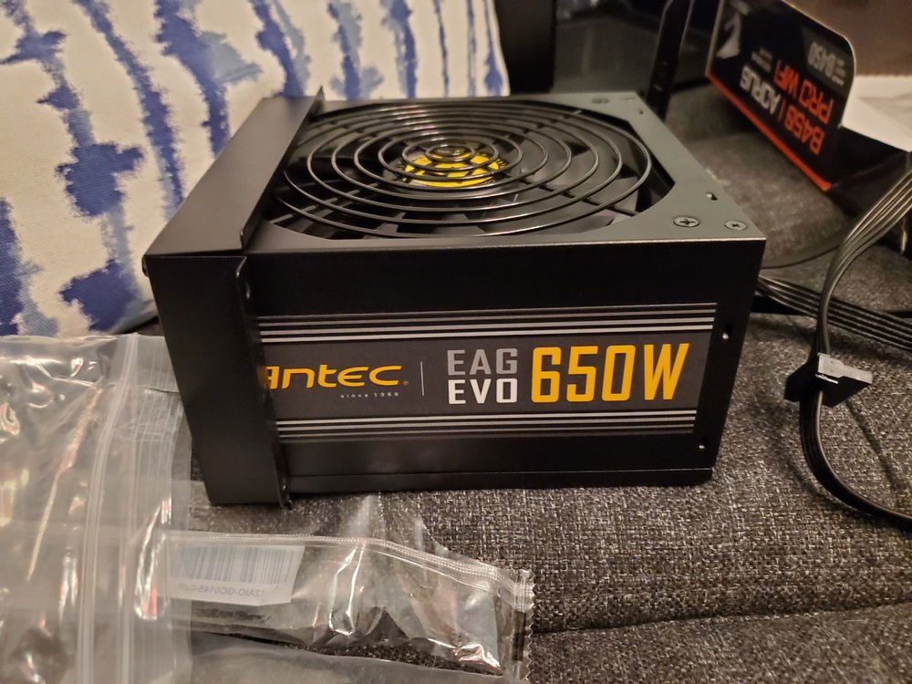 650 watt to allow for future expansion. Also a relatively inexpensive and reliable option in China.