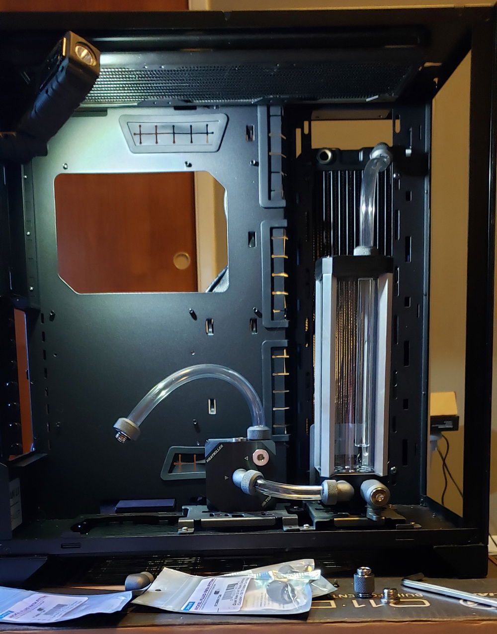 Drain valve now in a more convenient location. Clearance is tight but the front glass slides on w/out problem.