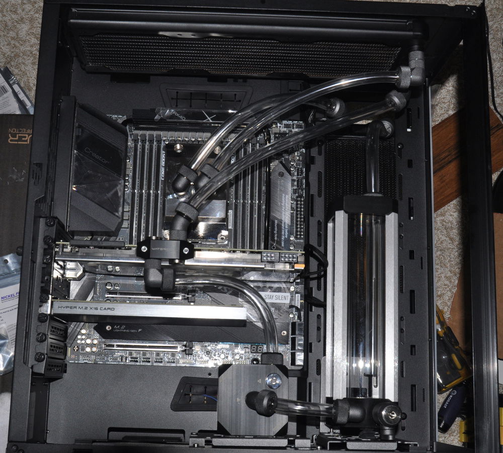 Plumbed with horizontal radiator I/O ports located at top right.