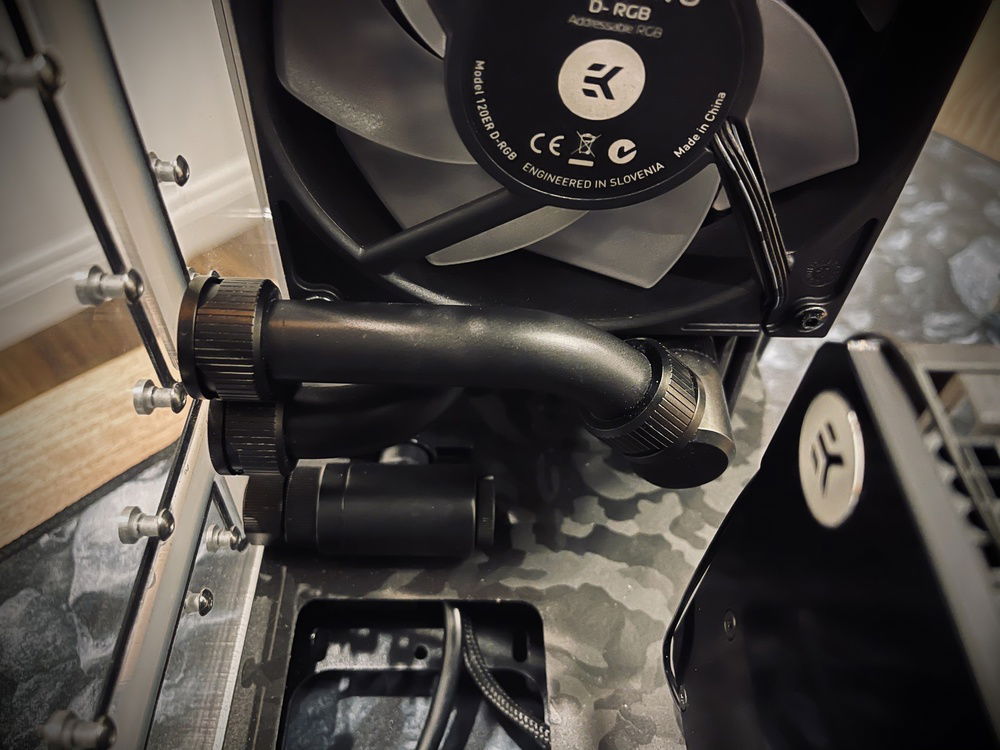 Closeup of bottom radiator custom matte black tubing.