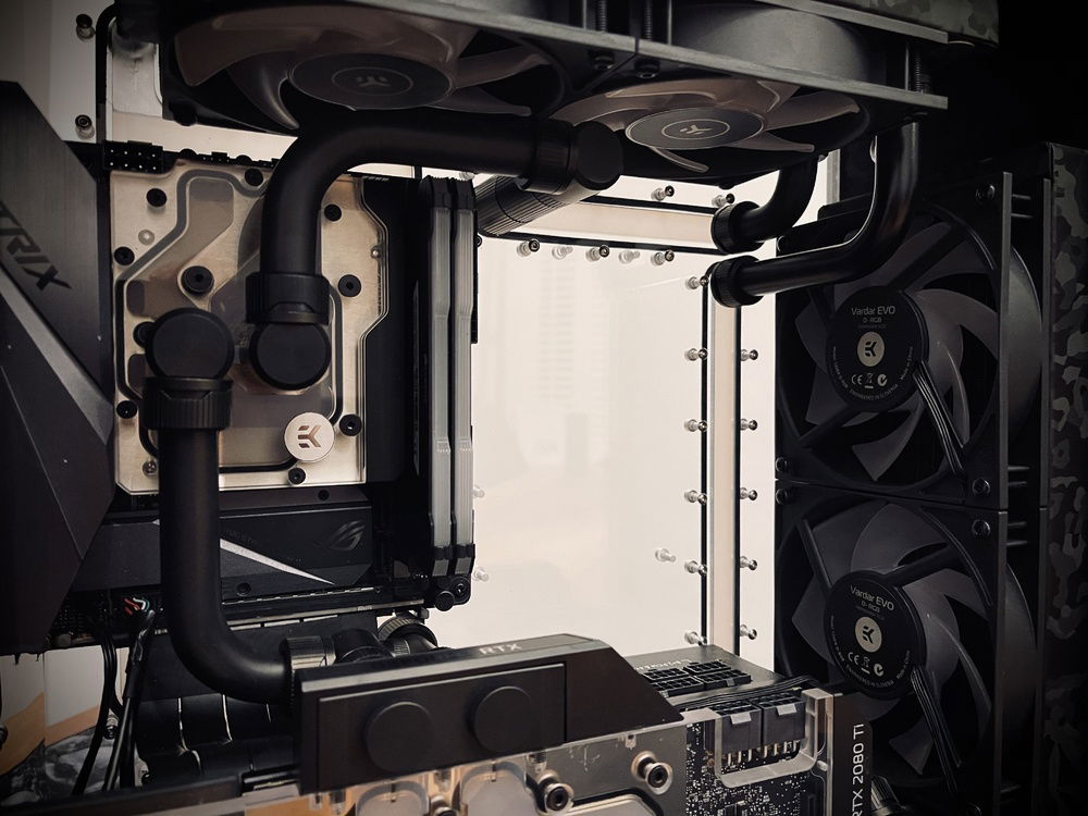 Closeup of EKWB motherboard monoblock and quantum fittings.