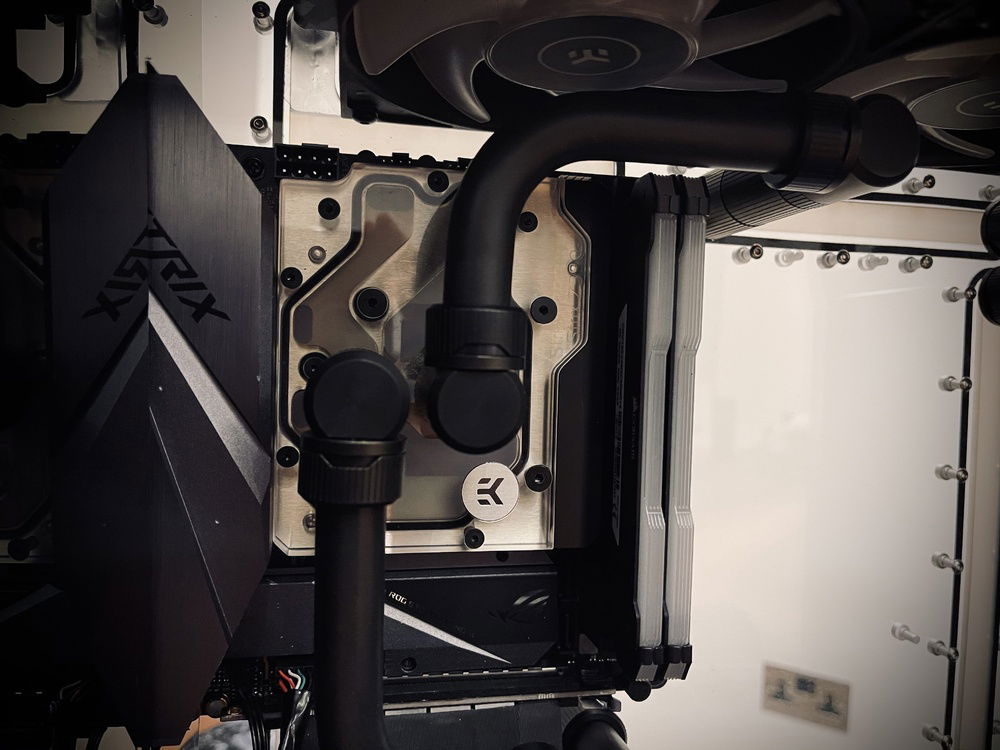 Closeup of EKWB motherboard monoblock and quantum fittings.