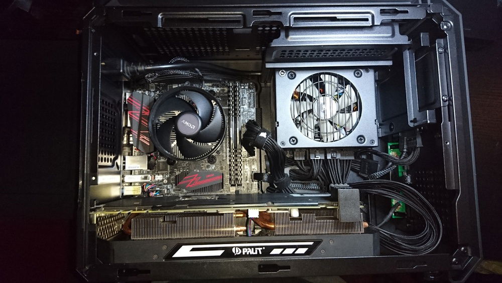 Built inside the case. Had to cut a slot on the case to fit the gpu.