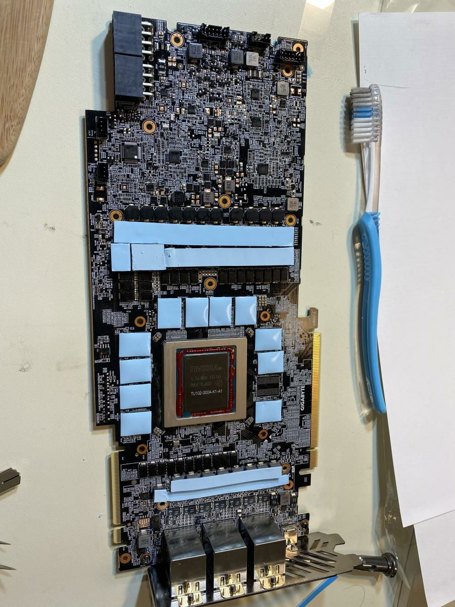 Covalent coating and thermal pads applied to GPU, ready for liquid metal application.
