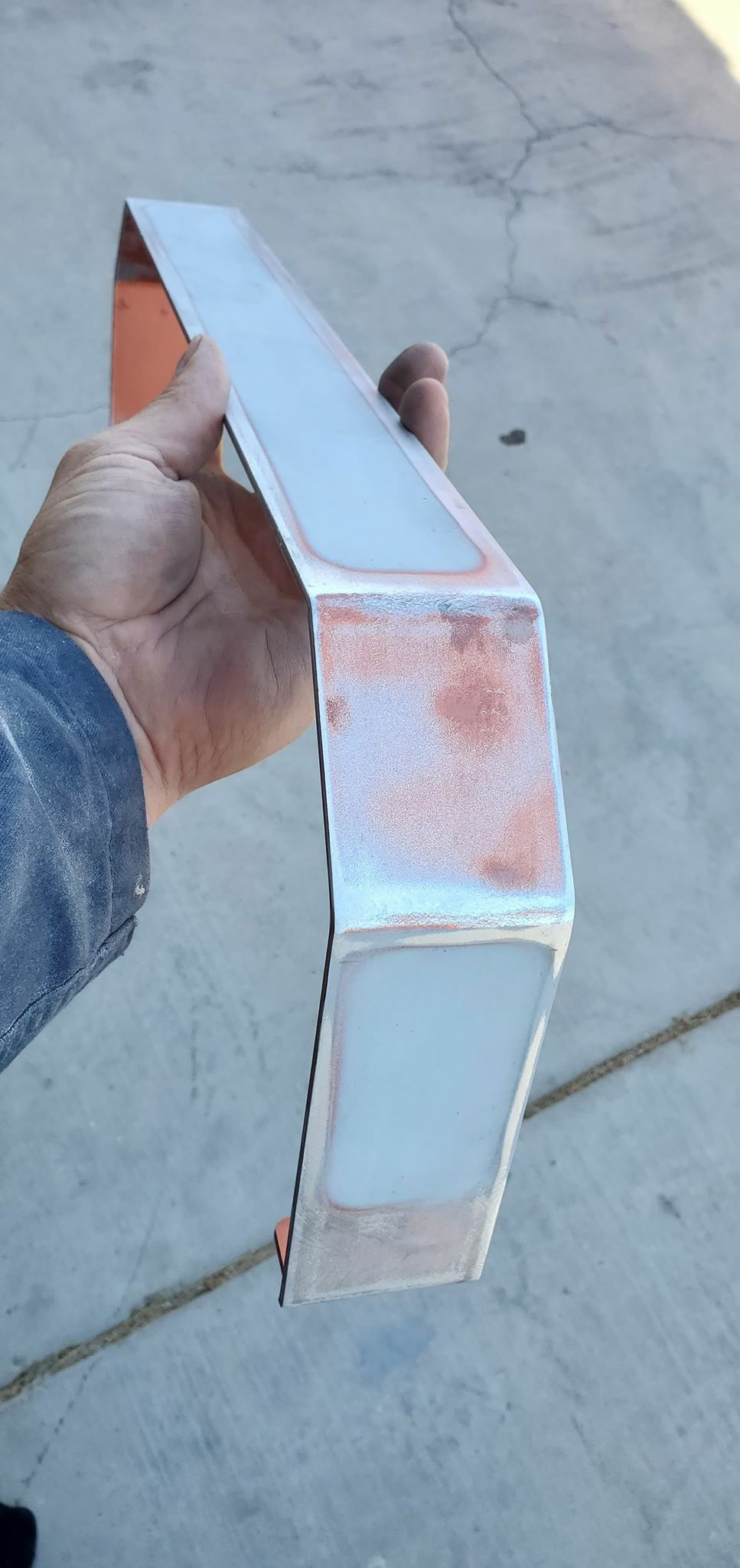 then sanded down with 80 grit, 100 grit, then 200 grit. to where it was seamless from the bondo to the metal.