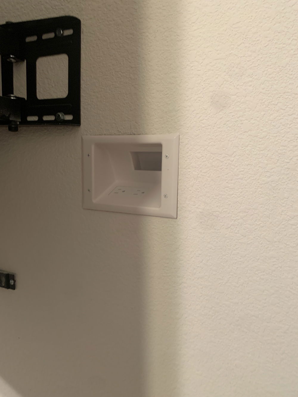 Installing the power pass through for cable management.  Was a gut check cutting into the wall.