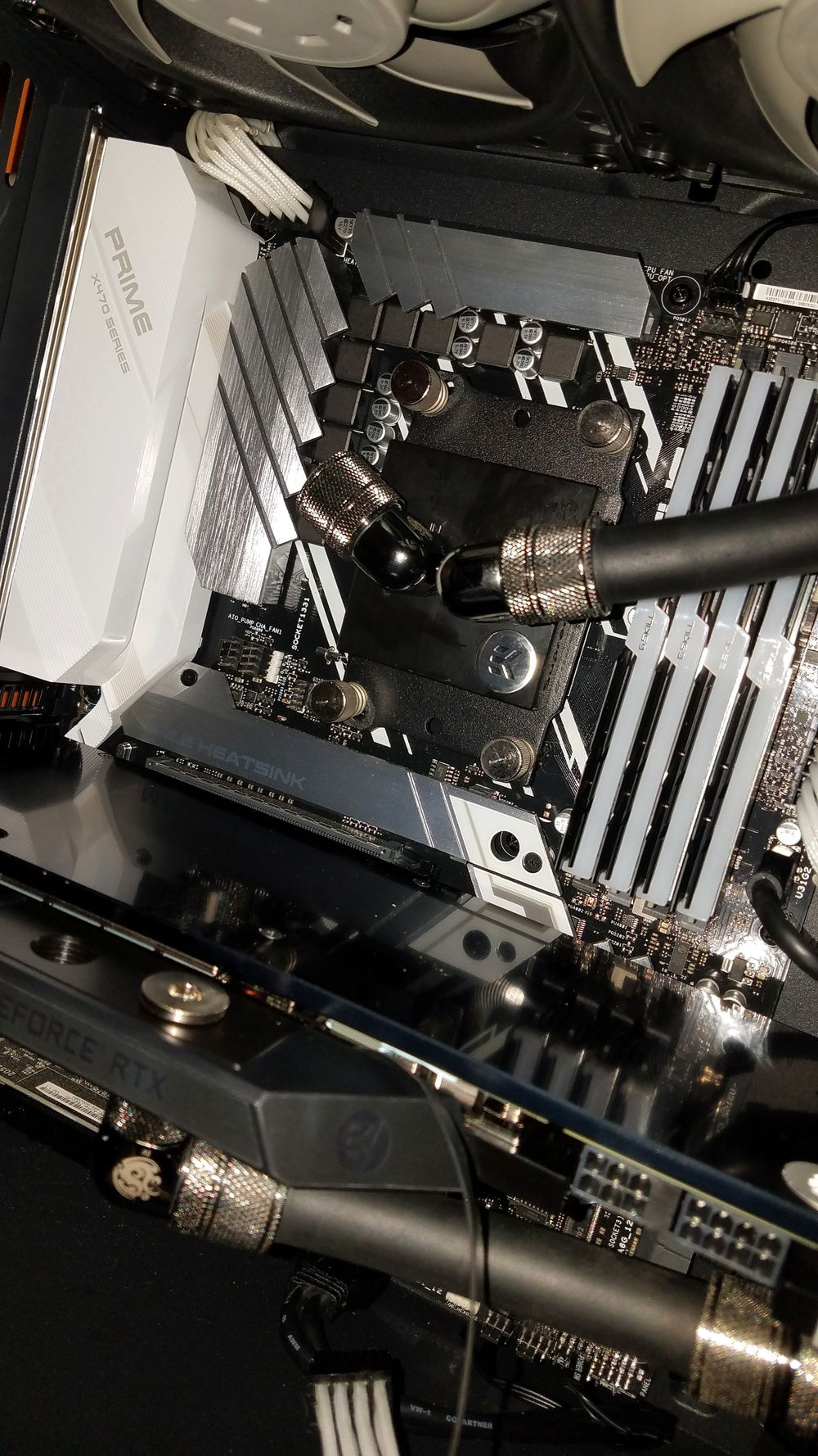 Plumbing second revision of cooling loop after adding a GPU block and top radiator