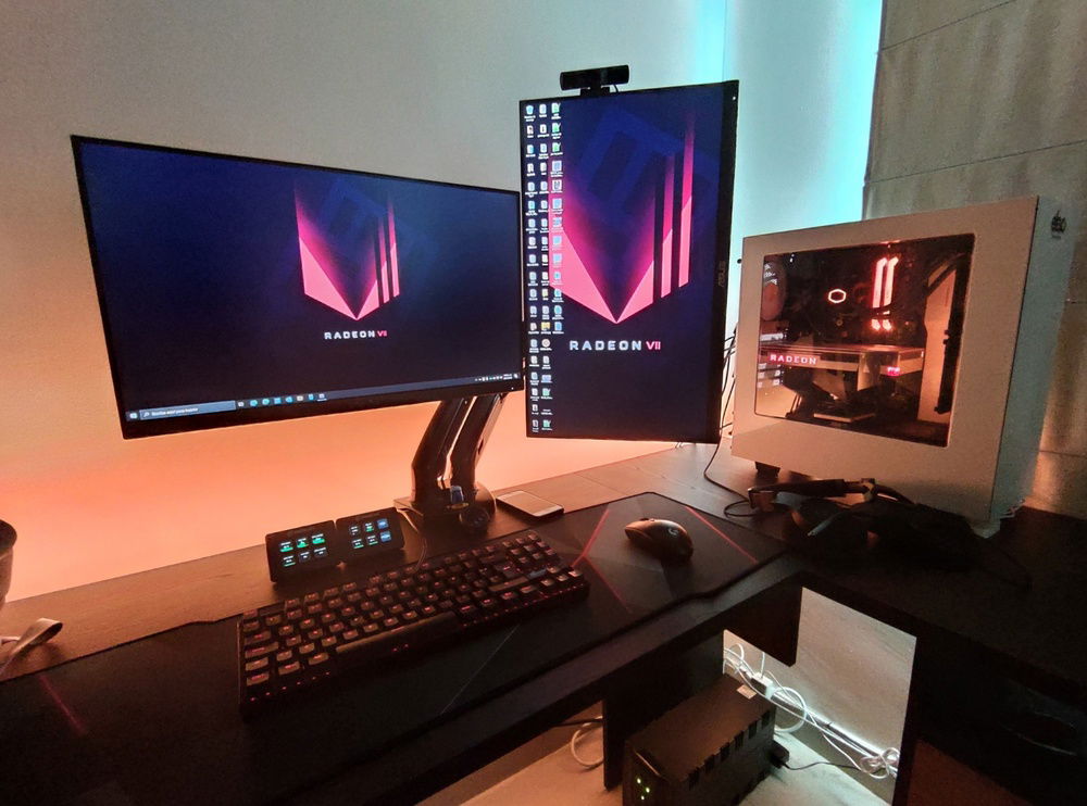 The lightstrip behind the desk is RGB