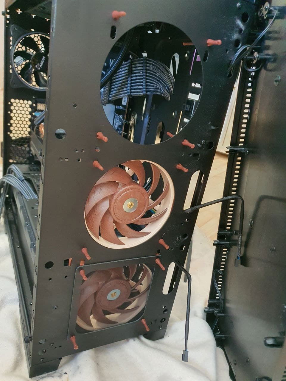 Swapped the fans for Noctua NF-A12x24 PWM and added some dust filters while the front was open