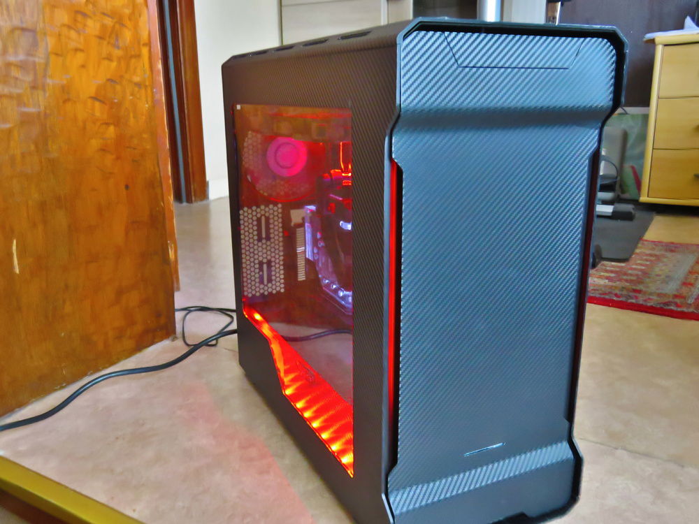 This fully plasti-dipped white case got stripped and wrapped in a carbon fiber coat.