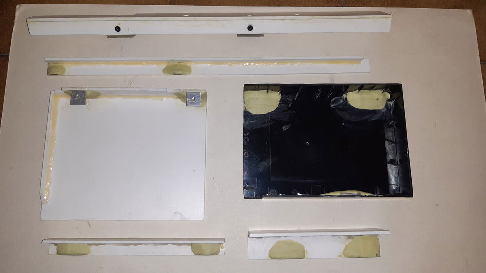 Cover are glued with putty and installed magnets