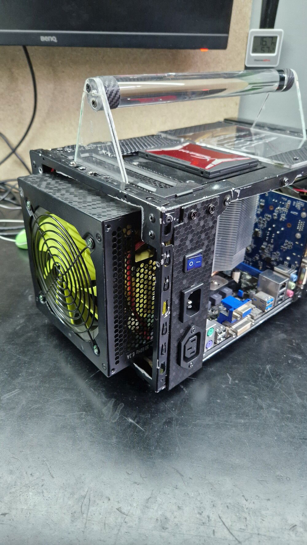 PSU in, fixed with screw on bottom