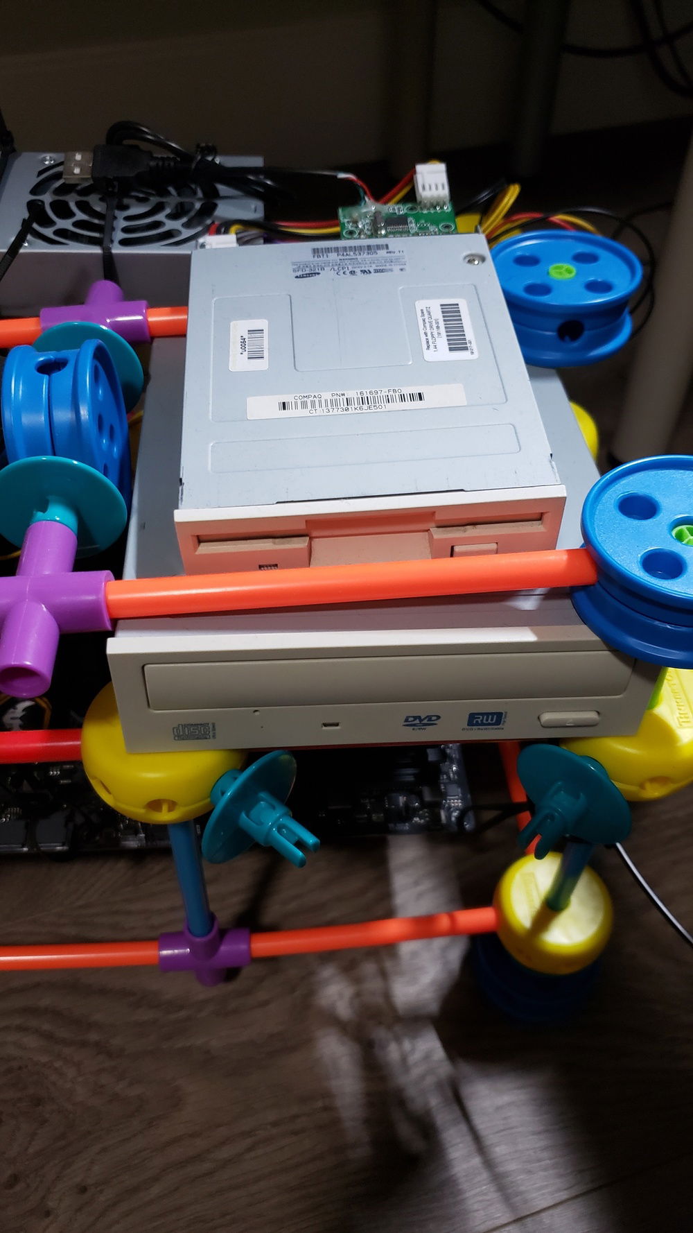 Both of them are laying on top of the case