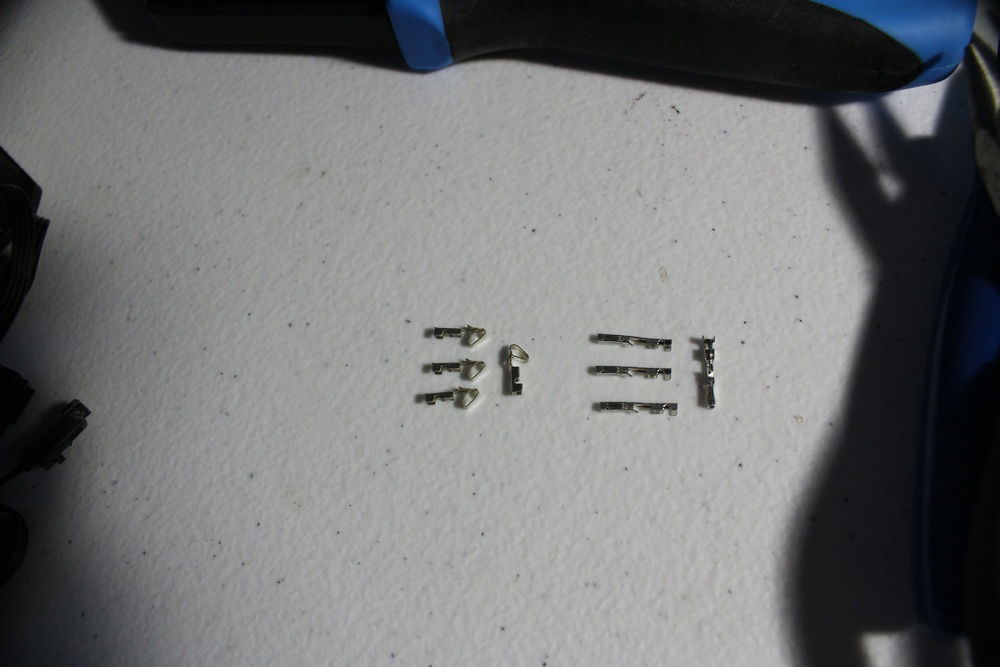 Terminals for Corsair's RGB fans. From left to Right: 4 female PWM fan terminals, 4 female RGB terminals.