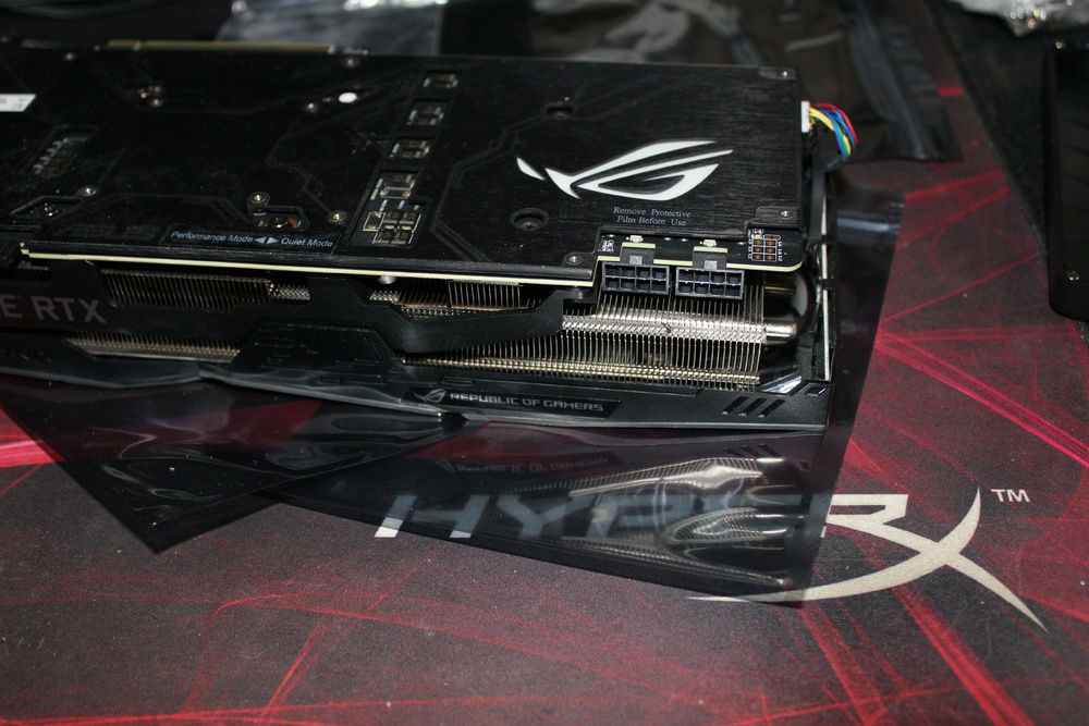 A dusty Asus Strix 2080 Ti OC card waiting to be prepped and be taken cared of.