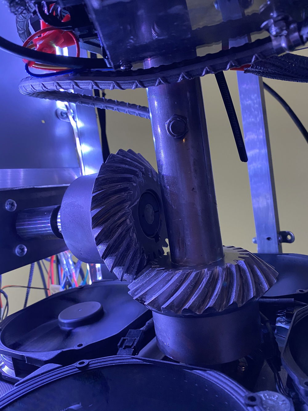 Spiral mitered bevel gears make the build go round