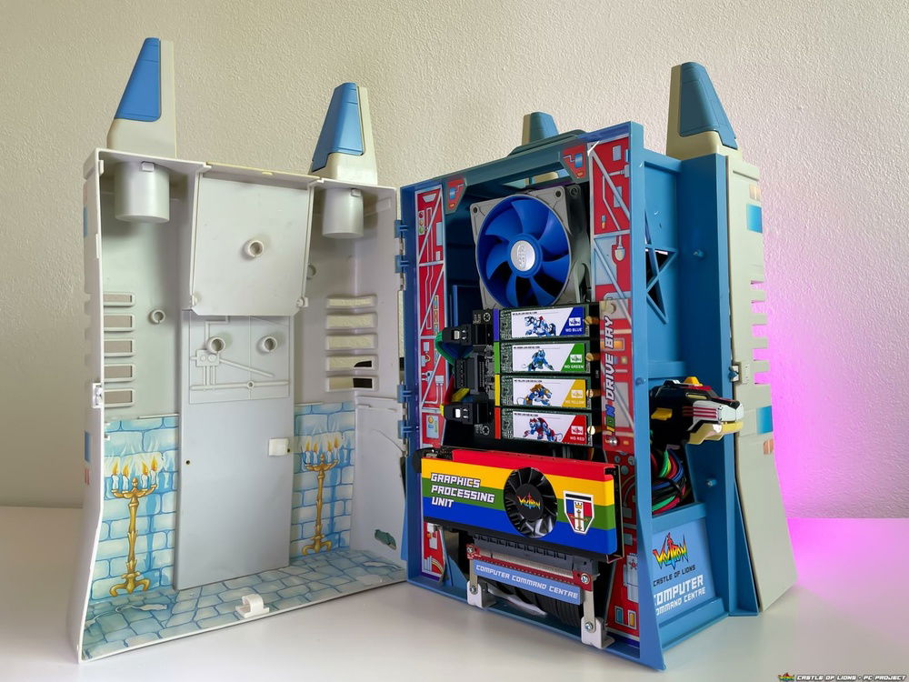 Inside of castle, left side of central chamber. Intake fan top for the 92mm AIO. M.2 bay for the Blue, Green, Red and Yellow Lion drives. RX550 GPU mounted bottom