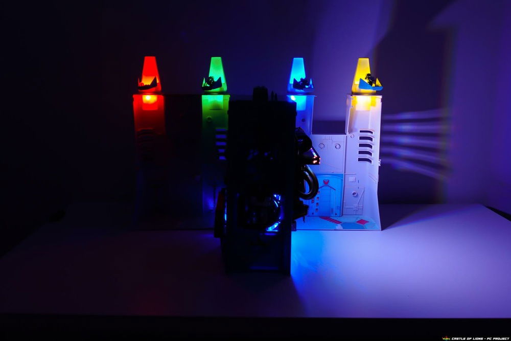 The castle at night, featuring the lit up turrets