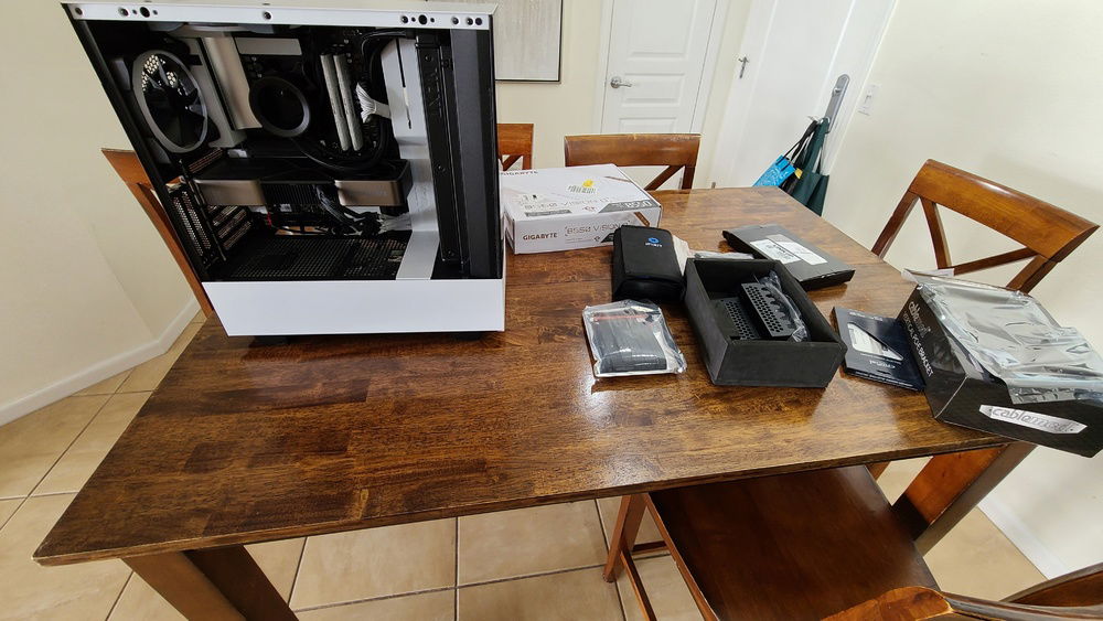 2 months later, cablemods, and vertical GPU bracket + riser cable all arrive. Also picked up some additional ballistix ram. time to finish this thing!