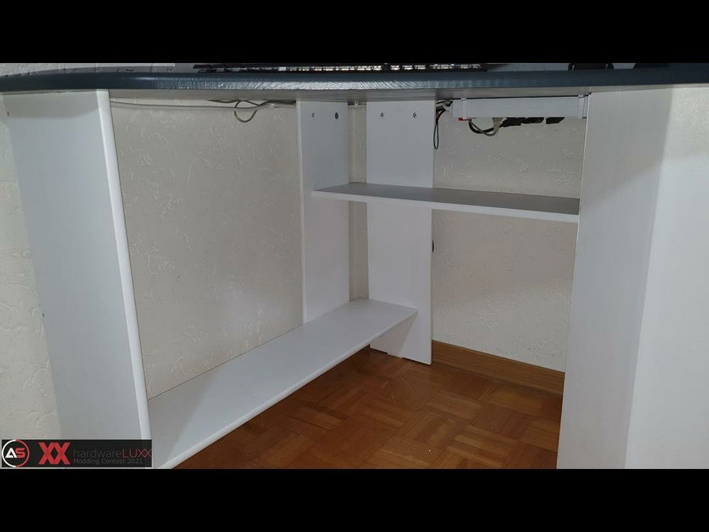 under the table (cable management... ^^)