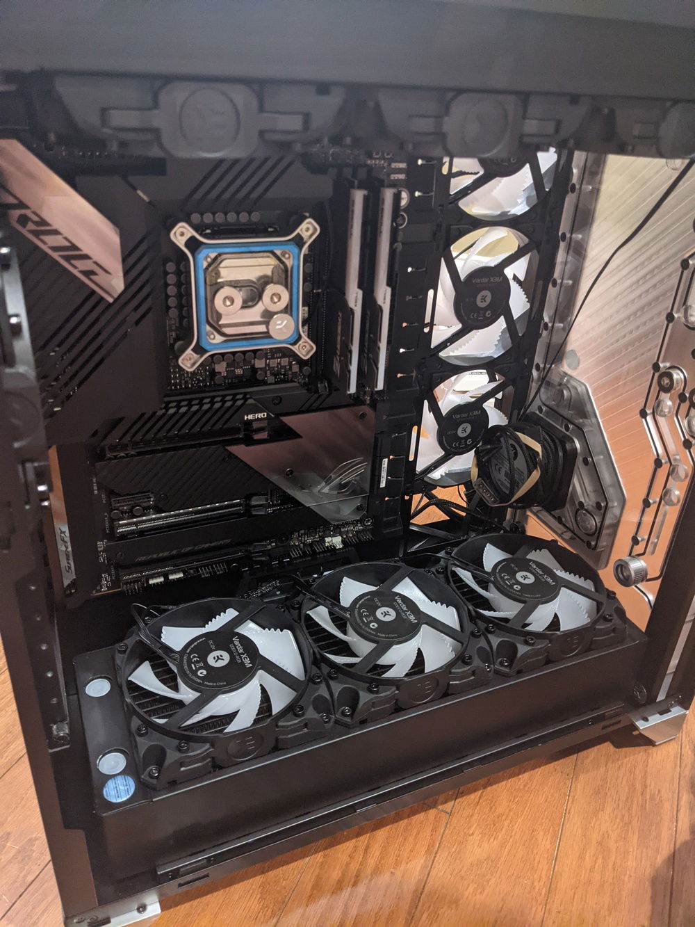 Installed motherboard, radiators, and fans into the case.