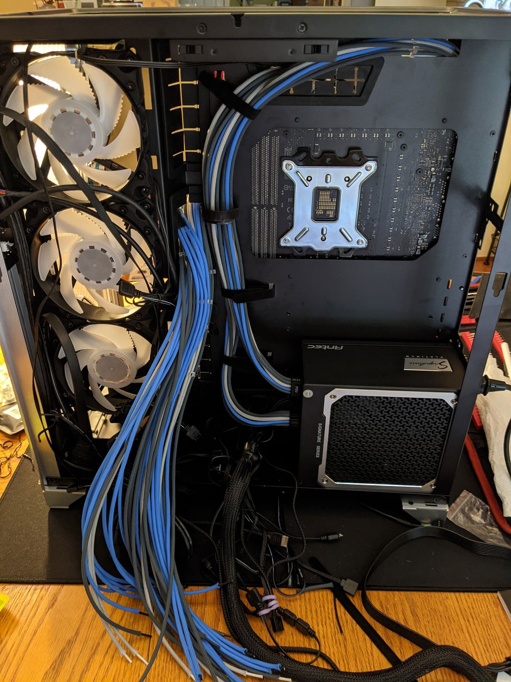 After making some novice mistakes, I finaly finished the PSU-side of the EPS cables. I am already starting to appreciate just how much custom length PSU cables will help with managing this rat's nest of cables.