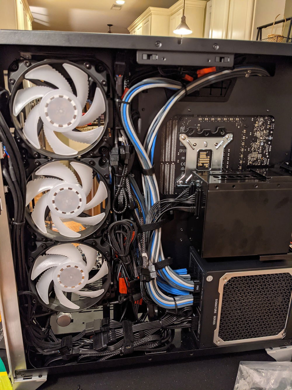 Taming the massive amount of cables for this build. Took me quite a while but I'm very happy with how clean it looks.