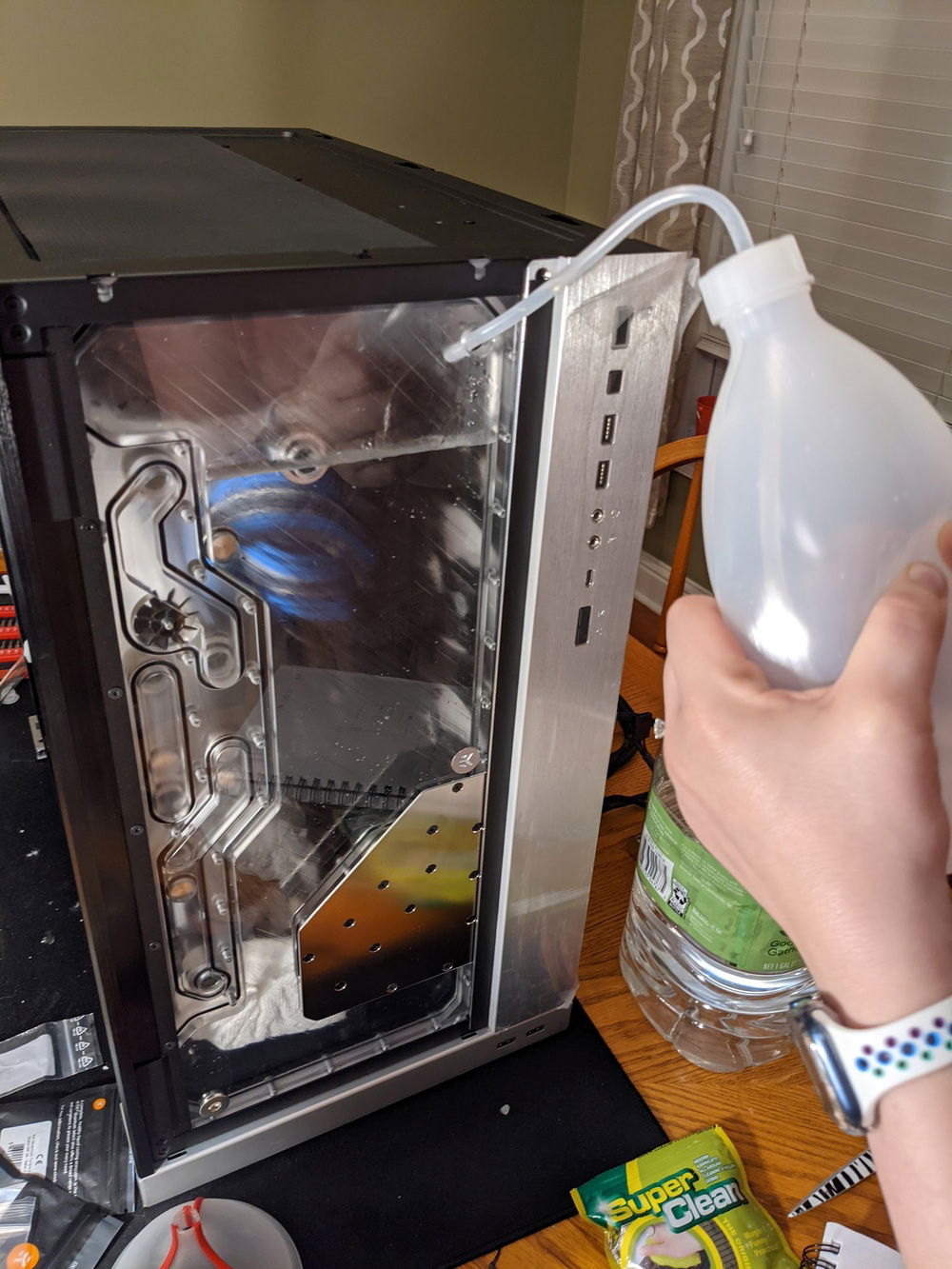 My wife helping me fill the loop for the first time for leak testing.