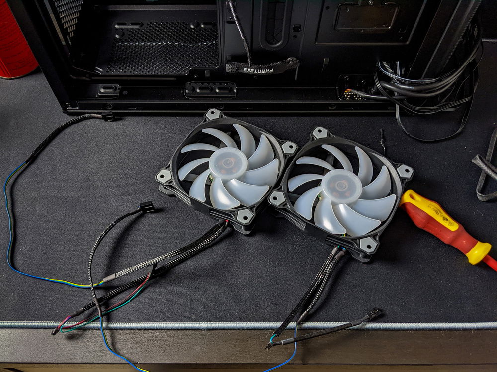 ... we soon had the fans wired back up with custom length wires to avoid having excess clogging up the rear.