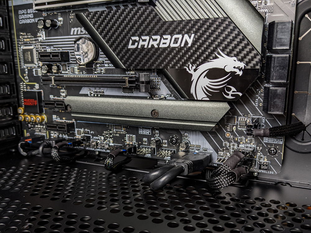 Just a small section of sleeving on each cable can make the front much cleaner.