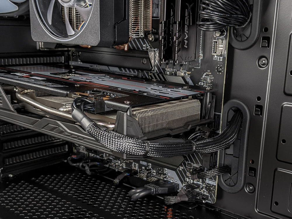 Tying the PCIE cables round the side of the graphics card not only keeps them nice and neat, but with a little tension round the back can help fight GPU-sag