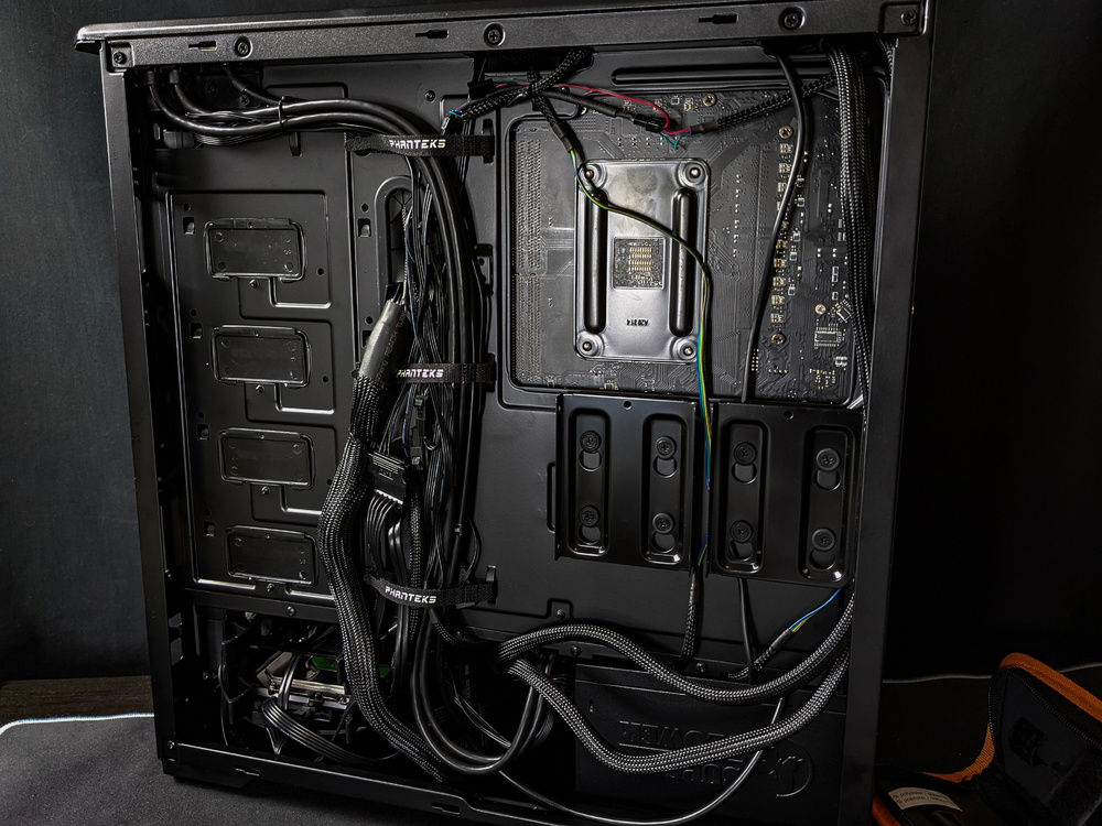 So many cables from those front fans and IO makes it a little scrappy round the back, but the velcro ties just about keep them in check.