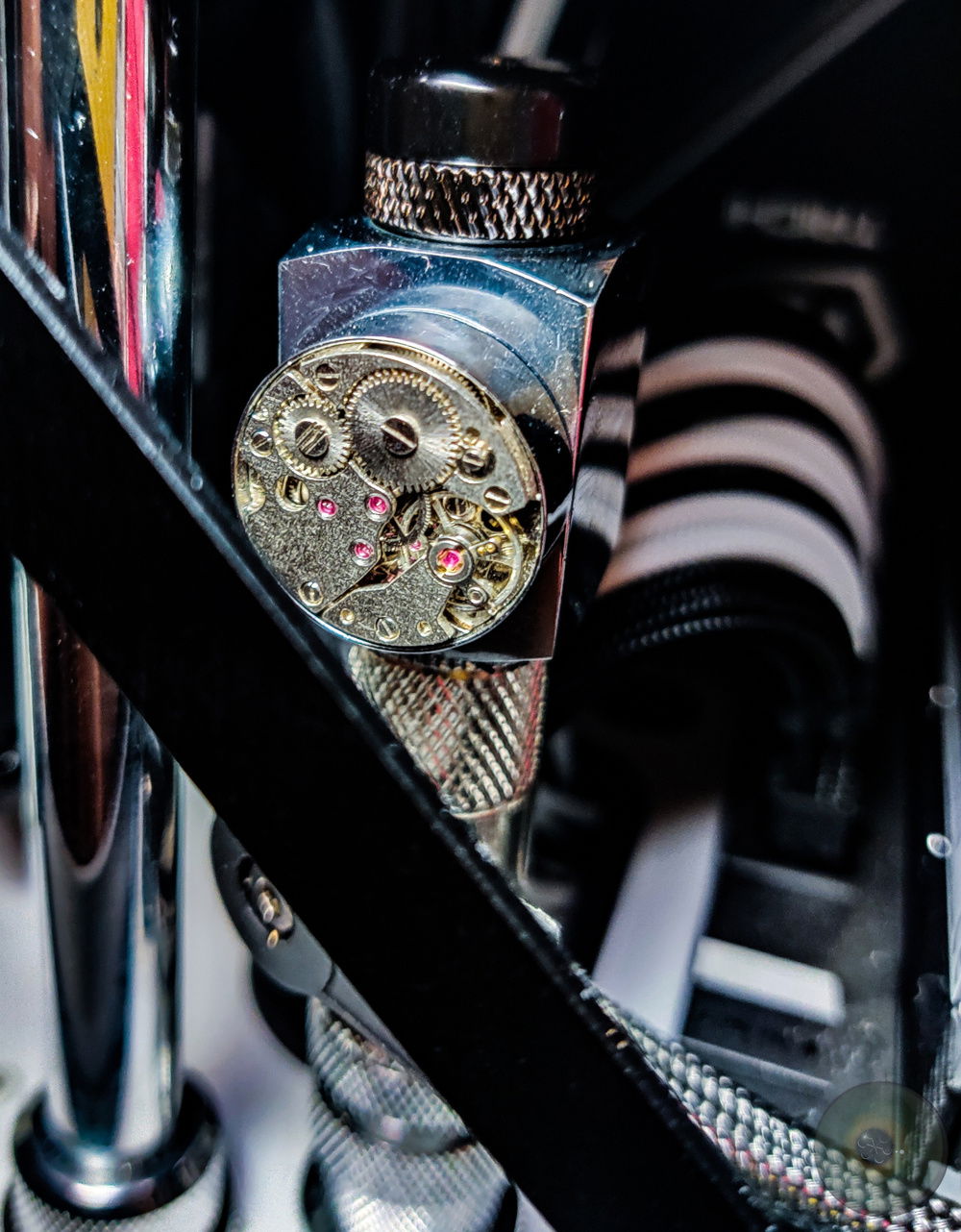 Steampunk vibes from the left over watercooling, left unused inside the case