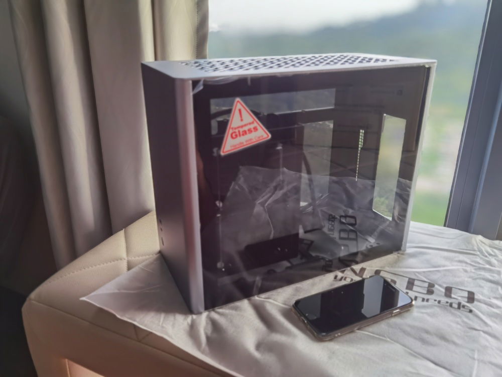 Jonsbo A4 ver 1.1. Comes with a PCIe riser for mounting the GPU vertically