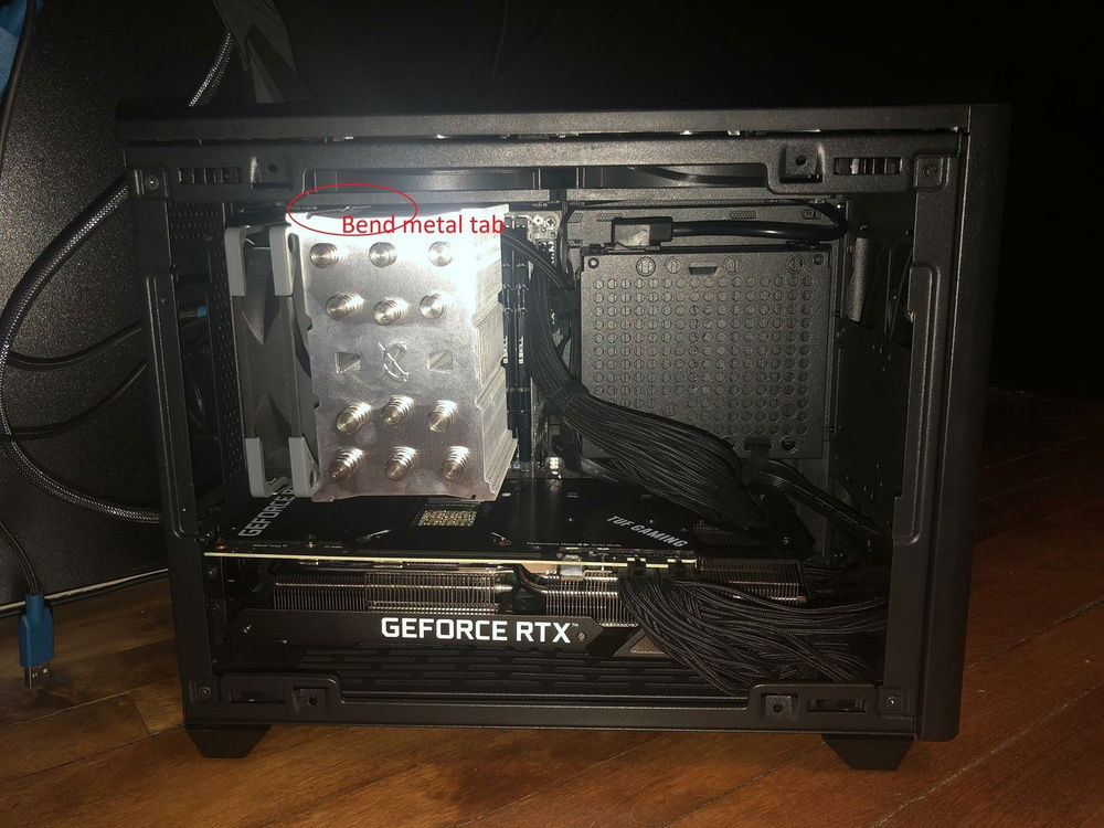 Bend top fan tab on Mugen 5 to fit full thickness fan above on this motherboard.