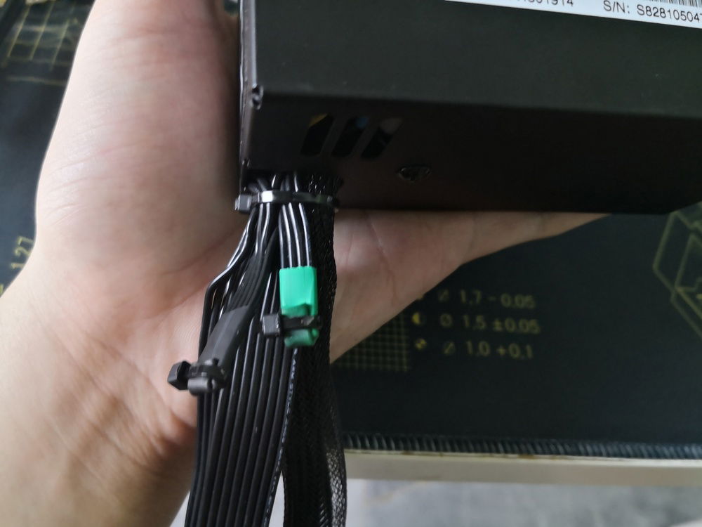 My FSP PSU is non-modular, and to lessen the cables I need to deal with, I clipped some of them off and "terminated" them using some insulated heat shrink tubing. The zip-tie is just to ensure the heat shrink tube stays there, but now that I think about it, it isn't really necessary.
