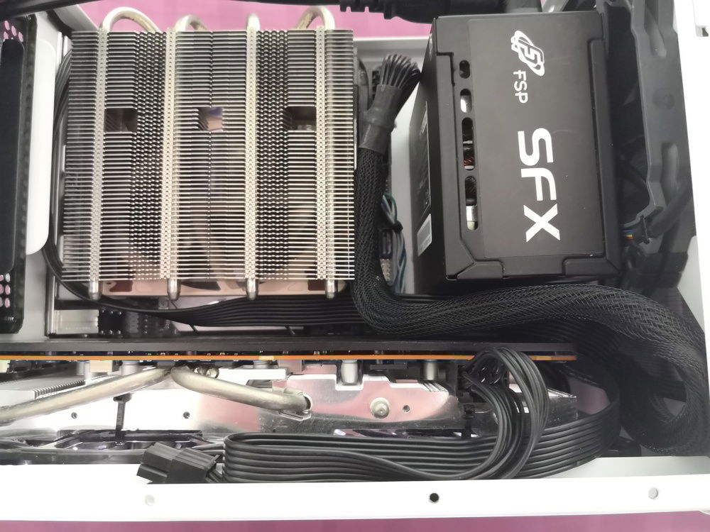 Yet another top view of the final version of my Front PSU Mod. Tbh at the time I just wanted to "flex" my cable management/routing in this case since my PSU is fully-modular, and the cables were too long with very little spacing in between each components. Now that I look at it again, I think I could've done a better job.