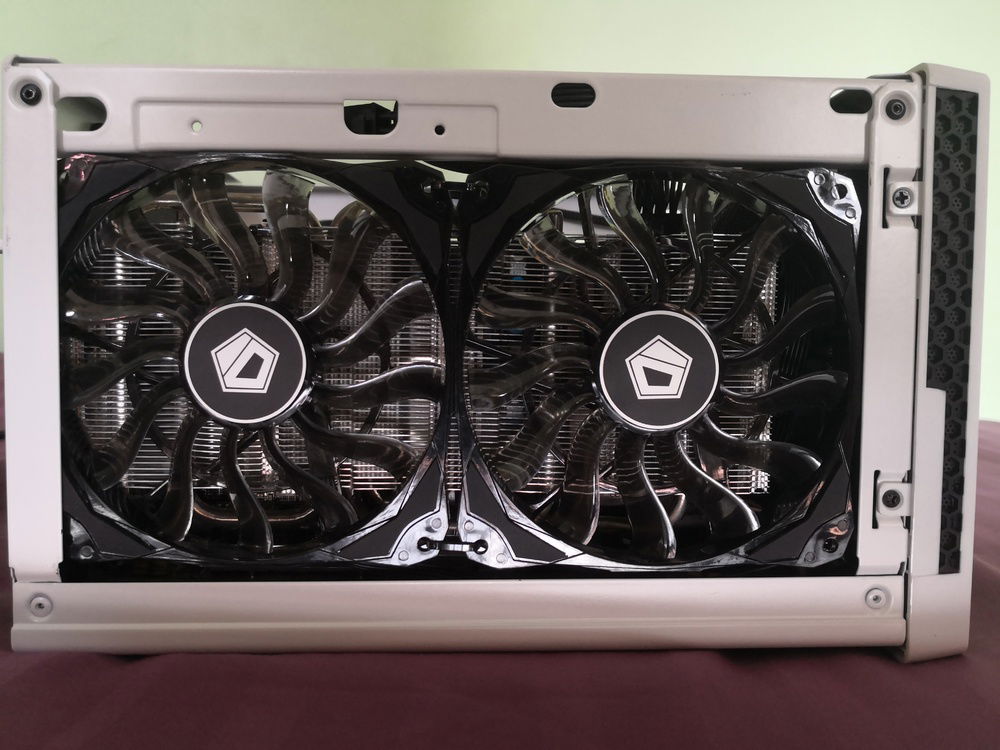 A view of my MSI RX 5700 Mech OC that I deshrouded and replaced the stock fan shroud with 2x120mm slim fans from ID-Cooling. The specific fan model was ID-Cooling NO-12015. I couldn't afford the Noctuas at the time, and with the Arctic P12 slims coming soon, I might consider replacing these fans.