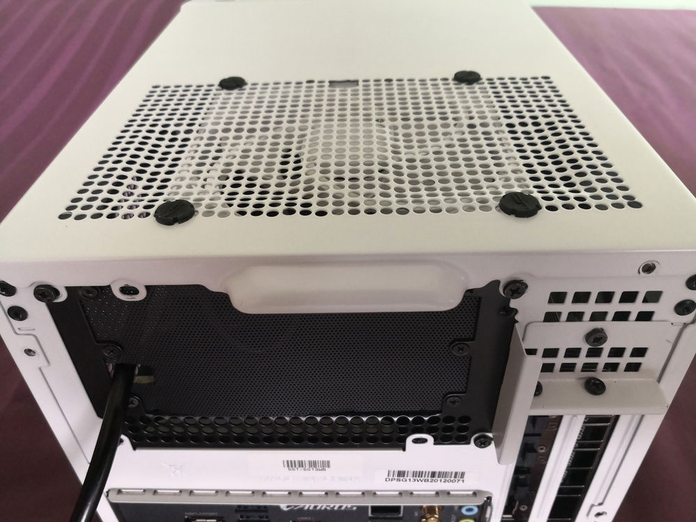 Rear view of the fully built case. The Arctic P12 was mounted to the top panel using rubber screw mounts I had from the XT140 fans.