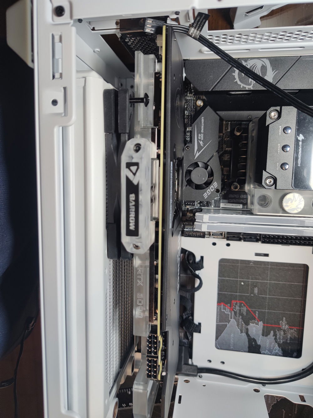 I installed my water block as soon as it arrived and tested the fitment again; as planned, it gave just enough space to fit the bottom radiator fans with just enough of a gap to be practical, airflow-wise.