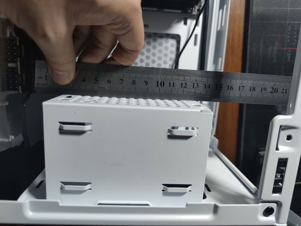 Measuring out the PSU cage dimensions so I could decide on the shroud size and LCD placement.