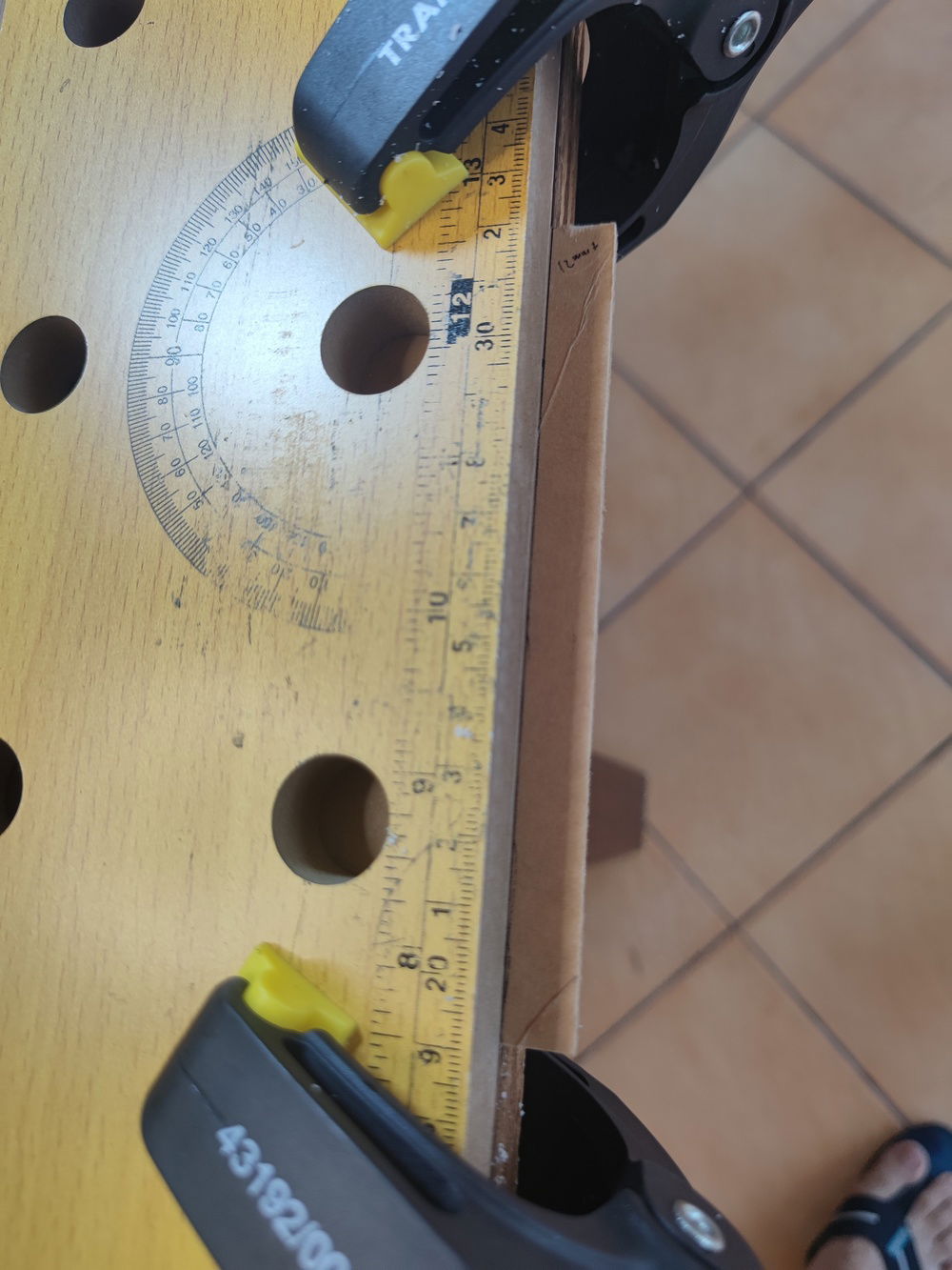 Bending the acrylic turned out to be easier than expected; but the problem became one of positioning and lining up the screw holes. Overheating was a real concern as well.