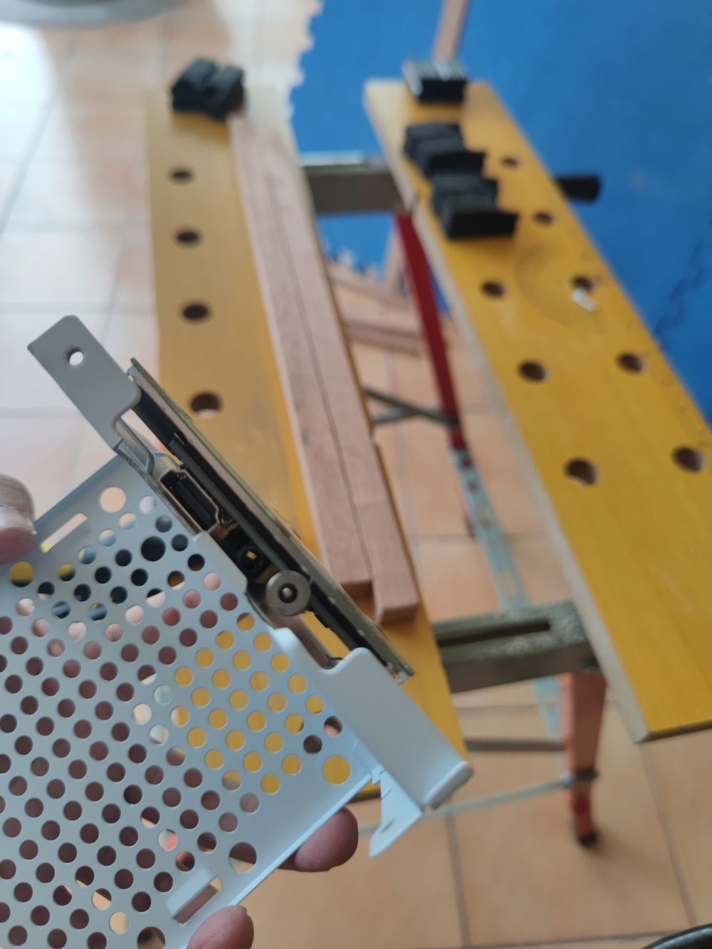 I had to cut away some PSU cage material fo the cables to have a clean shot through the side and past the front metal access holes.