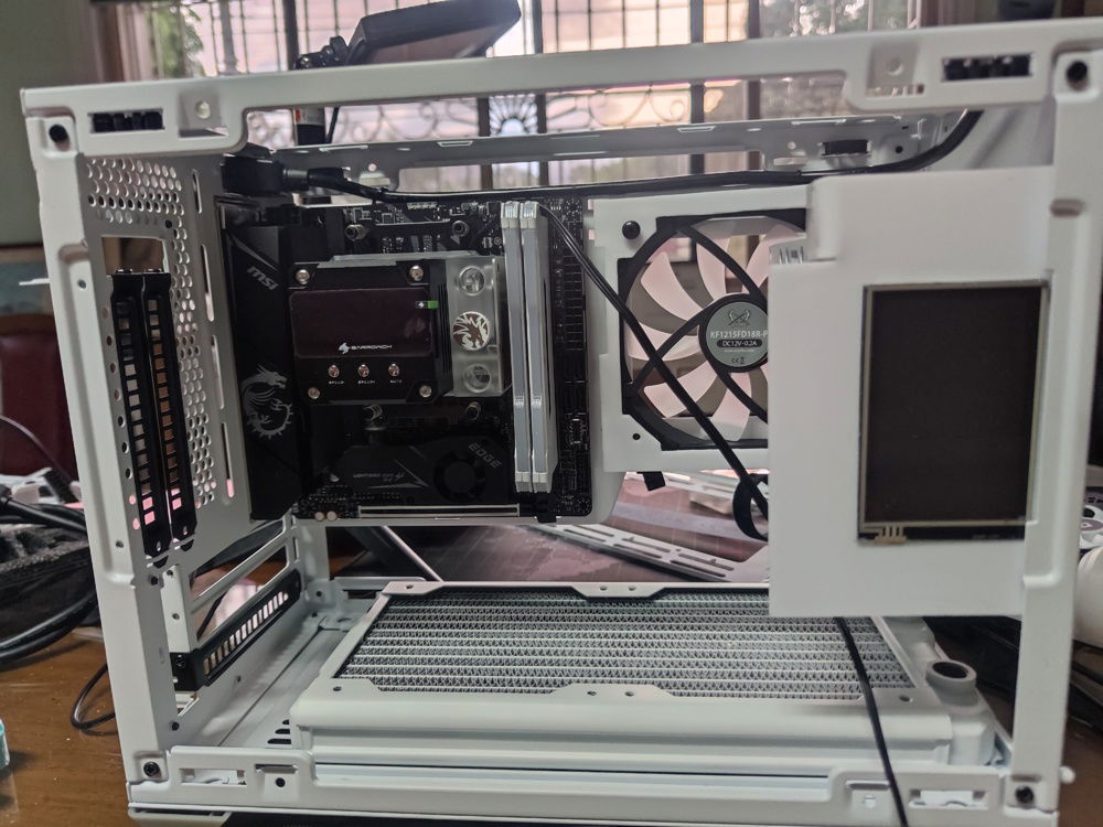 I would end up cutting off a big portion of the top of the shroud to fit my tubing, but otherwise the shroud served its purpose of hiding the PSU cage and the LCD PCB.