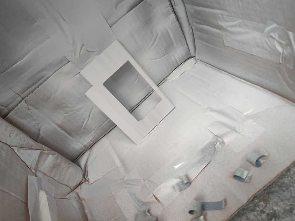 Three coats of white and gray was used to finish the shroud/frame.